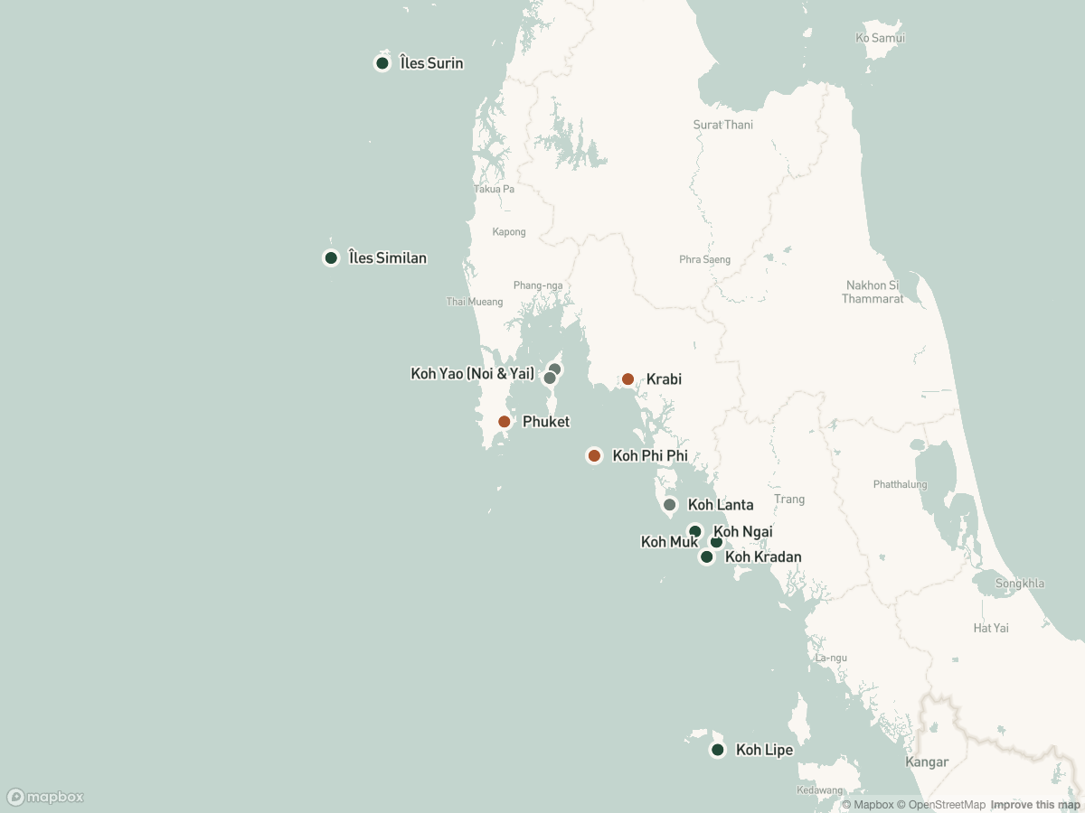 Carte de la côte Andaman thaïlandaise situant douze îles et ports d'accès, colorés selon leur niveau de fréquentation